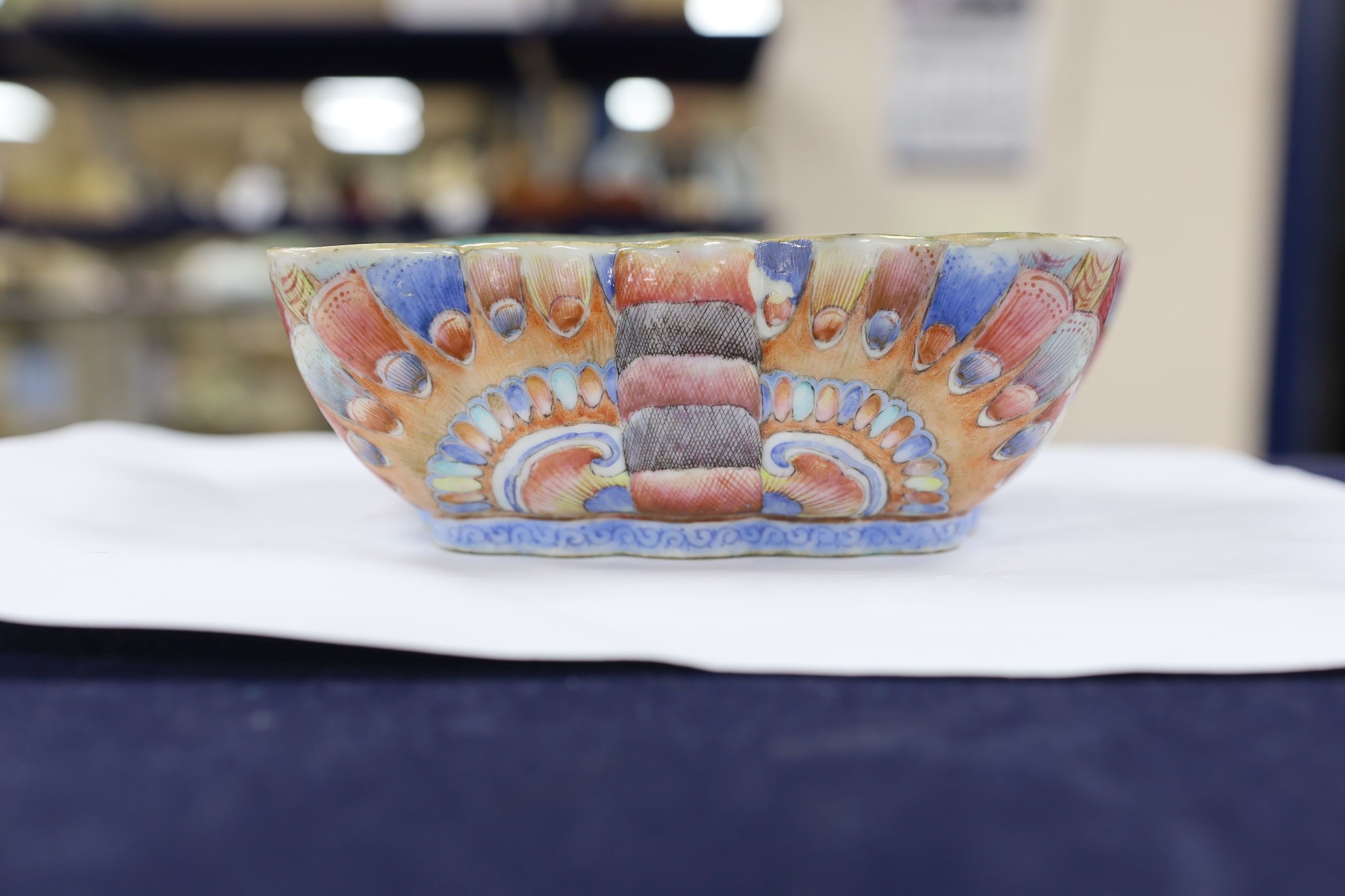 A Chinese enamelled porcelain ‘butterfly’ dish, 19th century, ground off reign mark, 19 cms wide at the front.